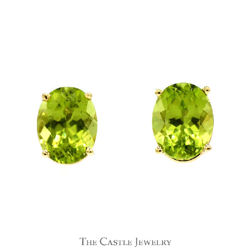 Oval Peridot Stud Earrings in 14k Yellow Gold Butterfly Pushbacks